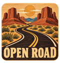 Open Road sticker with wood-grain-style desert mesas, a winding highway, and a golden sun